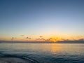 A view of Seven Mile Beach in Grand Cayman Island with a beautiful sunset Royalty Free Stock Photo