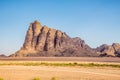 View at the Seven Pillars of Wisdom rock formation in Wadi Rum valley - Jordan Royalty Free Stock Photo