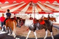 Fair pony ride Royalty Free Stock Photo