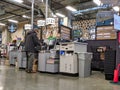 View of several self checkout counters in a QFC grocery store