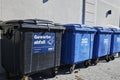 View of several waste containers at a waste collection point in an industrial park in Berlin, Germany