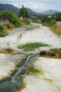 View of the shallow river bed Fonias in Lardos in August. Rhodes Island, Greece Royalty Free Stock Photo