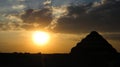 View of the shape the Pyramid of Djoser (Step Pyramid) Saqqara, Cairo(Egypt). Backlight photo Royalty Free Stock Photo