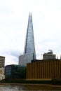 View of the Shard from the river Thames just around the bend from the Cannon Street Railway Bridge and Station.