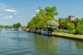 View of the Sharpness - Gloucester canal with St Mary the Virgin Church in the background, Frampton on Severn, Gloucestershire, UK