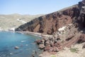 Dramatic volcanic cliffs at red beach at the south of the beautiful Greek island of Santorini.