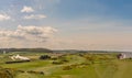 View of Sheringham Golf Course a Steam Train and the sea.