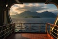 view from a ship deck showing a distant coastline with mountains