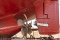 View on the ships rudder and propeller. Ship in a dry dock.