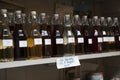 View of shopboard with bottles puring virgin olive oil