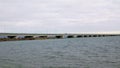 A view from the shore of a low-water bridge from the Sedanka station to the De Friz peninsula through the Amur Bay in the far east