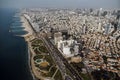 view from the shore to the modern district of Tel Aviv. Top view of the capital of Israel. Clean beautiful beach in the city Royalty Free Stock Photo