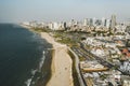 view from the shore to the modern district of Tel Aviv. Top view of the capital of Israel. Clean beautiful beach in the city Royalty Free Stock Photo