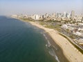 view from the shore to the modern district of Tel Aviv. Top view of the capital of Israel. Clean beautiful beach in the city Royalty Free Stock Photo