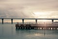 View from the shore on a very long bridge Royalty Free Stock Photo