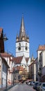 View of the sibiu lutheran cathedral from the street adjacent to the old town Royalty Free Stock Photo