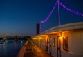 View of side of delta king paddle boat in old sacramento with bridge and river