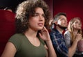 View from side of excited girl watching intriguing movie. Royalty Free Stock Photo