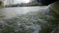 View from side of moving boat wave