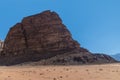 A view of the side of a wind eroded mountain in Wadi Rum, Jordan