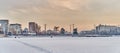 View of sights of downtown of Yekaterinburg, Russia, from ice of city pond, covered with snow. Royalty Free Stock Photo