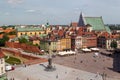 View of Sigismund column and the colorful historical buildings in royal castle square, Warsaw