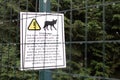 View of sign Coyotes in Stanley Park following attacks by animals on trails within the park