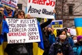 View of sign Stop Russia during the rally against invasion of Ukraine in front of Vancouver Art Gallery