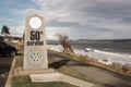 View of sign 50th Parallel with Campbell River in the background