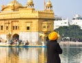 View of a Sikh devotee as holy guard in the golden temple shri Harmandir Sahib in Amritsar, India Royalty Free Stock Photo