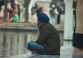 view of sikh devotee in golden temple sri harmandir sahib at Amritsar, India Royalty Free Stock Photo