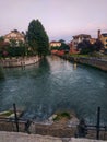 View of the Sile river seen from the Treviso riverside with bridge