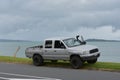 View of silver Mazda Bounty Turbo pickup truck parked at Eastern Beach