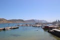View of Simon`s Bay with town pier, marina and dockyard. Simon`s Town, South Africa.