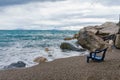 View of the sinking chair in front of the sea with soft gentle w Royalty Free Stock Photo