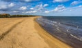 The view from Skegness pier, UK along the wide sandy beach