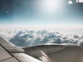 View of sky from above the clouds and airplane engine Royalty Free Stock Photo