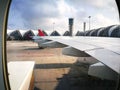 The View of the sky and airport from the airplane window Royalty Free Stock Photo