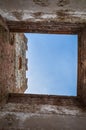 View of the sky from a Crenellated Tower of the Ancient Italian Walled City of Soave in the Verona area. Royalty Free Stock Photo