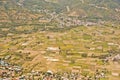 View from the sky of a landscape of mountains, settlements and rice fields Royalty Free Stock Photo