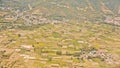 View from the sky of a landscape of mountains, settlements and rice fields Royalty Free Stock Photo