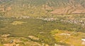 View from the sky of a landscape of mountains, settlements and rice fields Royalty Free Stock Photo