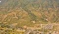 View from the sky of a landscape of mountains, settlements and rice fields Royalty Free Stock Photo