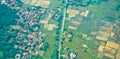 View from the sky of a landscape of rice fields and settlements Royalty Free Stock Photo