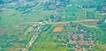 View from the sky of a landscape of rice fields and settlements Royalty Free Stock Photo