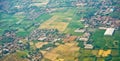 View from the sky of a landscape of rice fields and settlements Royalty Free Stock Photo