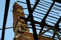 View of the sky from a building with a ruined roof