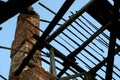 View of the sky from a building with a ruined roof