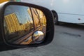 view of the sky in the right side car mirror in the evening at sunset. Royalty Free Stock Photo