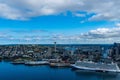 View of A skyline featuring two cruise ships docked at the marina Royalty Free Stock Photo